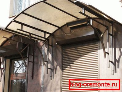 Polycarbonate visor and forging blends in well with wrought-iron porch railings