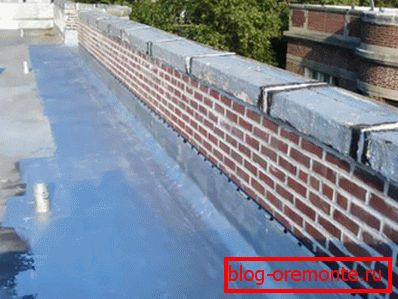 Parapet on the high-rise building with a flat roof