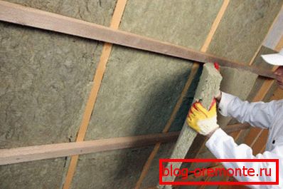 The process of warming the slope from the inside with stone wool