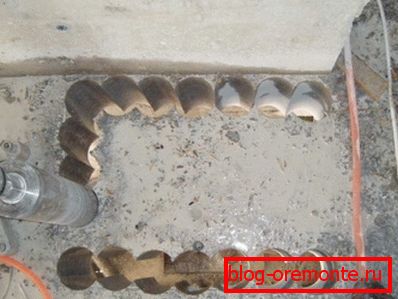Diamond drilling holes in concrete for decorating the hatch Diamond drilling holes in concrete for decorating the hatch