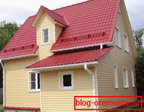 Beige siding with red tiles