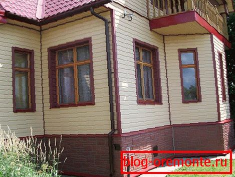 Beige siding with red trim