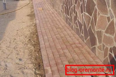 Decorative protective finish of the blind area of the building. Decorative protective finish of the blind area of the building.
