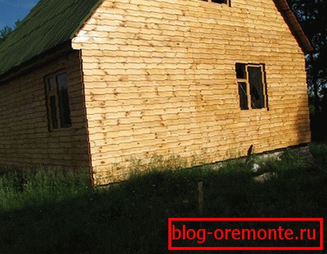 House covered with wooden clapboard