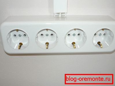 Photo of the installed outlet for four outlets Photo of the installed outlet for four outlets