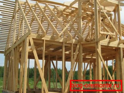 Frame and panel board construction of the house from a bar Frame and panel board construction of the house from a bar