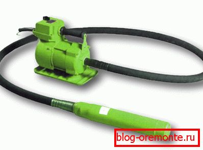 Classic electromechanical vibrator for concrete. Classic electromechanical vibrator for concrete.