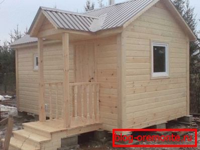 Compact bathhouse with porch without external and internal decoration Compact bathhouse with porch without external and internal decoration