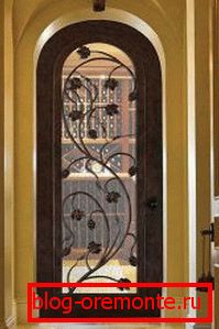 Wrought iron door with durable glass