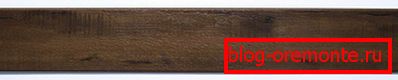 Laminate embossed into the register
