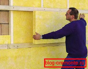 Amateur photo, the process of laying insulation from mineral blocks Amateur photo, the process of laying insulation from mineral blocks