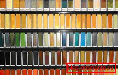 Amateur photo of the stand with samples of paints, which presents all the products of the store Amateur photo of the stand with samples of paints, which presents all the products of the store