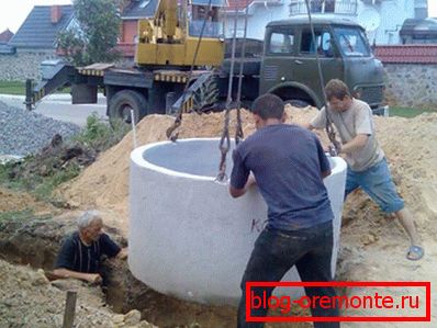 Installation of a well from reinforced concrete rings is relatively simple Installation of a well from reinforced concrete rings is relatively simple