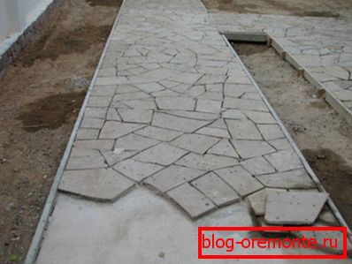 Paving of a natural stone on cement and sand solution. Paving of a natural stone on cement and sand solution.