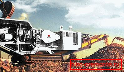 On the photo is a mobile complex for construction waste recycling. On the photo is a mobile complex for construction waste recycling.