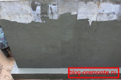 In the photo - the application of cement-polymer coating In the photo - the application of cement-polymer coating