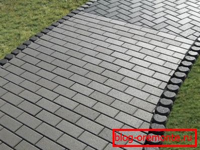 In the photo - blind area, made with the use of concrete tiles In the photo - blind area, made with the use of concrete tiles