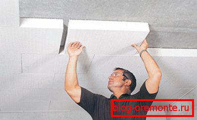In the photo - gluing foam plates to the ceiling
