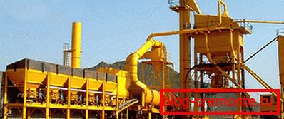 In the photo - the production of asphalt mix In the photo - the production of asphalt mix
