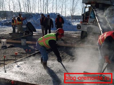 In the photo - steaming concrete during winter pouring of formwork In the photo - steaming concrete during winter pouring of formwork