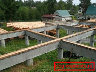 In the photo - a columnar foundation with a concrete grillage. In the photo - a columnar foundation with a concrete grillage.