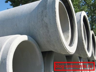 On the photo - products made of reinforced concrete with a bell and a sealing ring On the photo - products made of reinforced concrete with a bell and a sealing ring