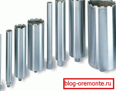 In the photo there is a crown for drilling holes in concrete of various diameters. In the photo there is a crown for drilling holes in concrete of various diameters.