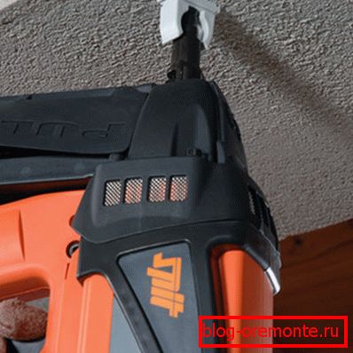In the photo - powerful equipment that allows you to quickly and efficiently fix the various elements in concrete In the photo - powerful equipment that allows you to quickly and efficiently fix the various elements in concrete