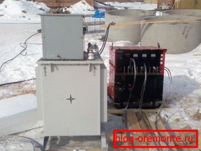 The photo shows a transformer for heating concrete in operation. The photo shows a transformer for heating concrete in operation.