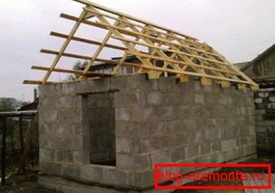 The photo is an example of a light dual slope roof. The photo is an example of a light dual slope roof.