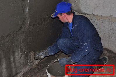 Applying a moisture resistant solution to the basement walls Applying a moisture resistant solution to the basement walls