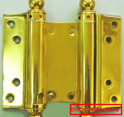 Gold loop with decorative tips Gold loop with decorative tips