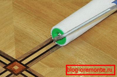 Parquet coating with varnish
