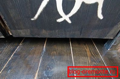 Floor covered with black stain