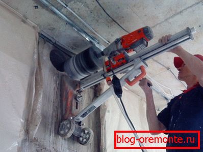 Professional diamond drilling holes in concrete Professional diamond drilling holes in concrete