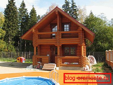 The realized project of a 2-storey bath from a bar on a country site The realized project of a 2-storey bath from a bar on a country site