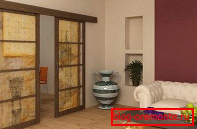 Two-compartment sliding door sliding interior door mechanism