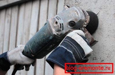 Concrete grinding with diamond wheel. Concrete grinding with diamond wheel.
