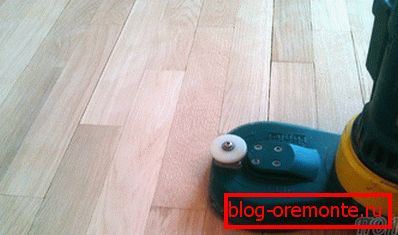 Sanding the floor