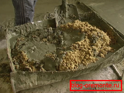 Mixing sand and cement. Mixing sand and cement.