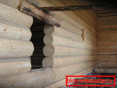 Collected log house directly on the object Collected log house directly on the object