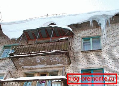 Icicles and snow on the roof