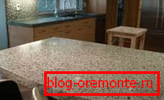 Concrete table top with marble chips in the interior Concrete table top with marble chips in the interior