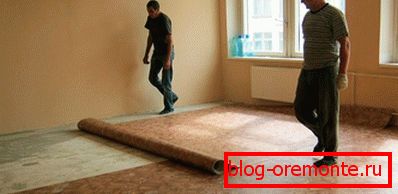 Laying linoleum on a concrete floor