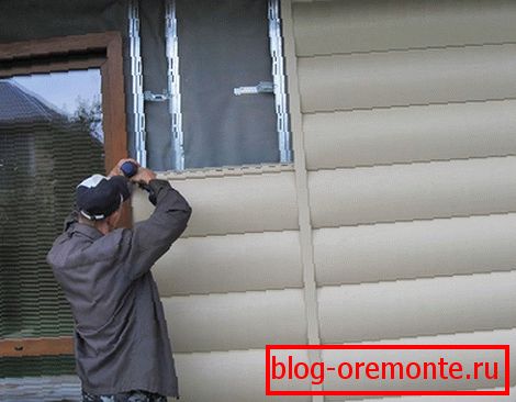 Vinyl siding under the block house