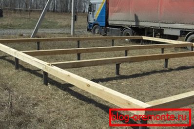 The appearance of the pile foundation with a wooden base for mounting the crowns The appearance of the pile foundation with a wooden base for mounting the crowns