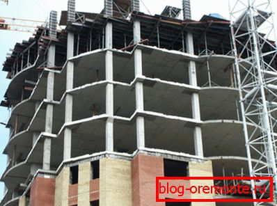 Reinforced concrete monolithic frame of the building at the construction site Reinforced concrete monolithic frame of the building at the construction site